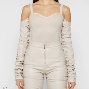 New never worn bodysuit top. Size 12 US stretchy